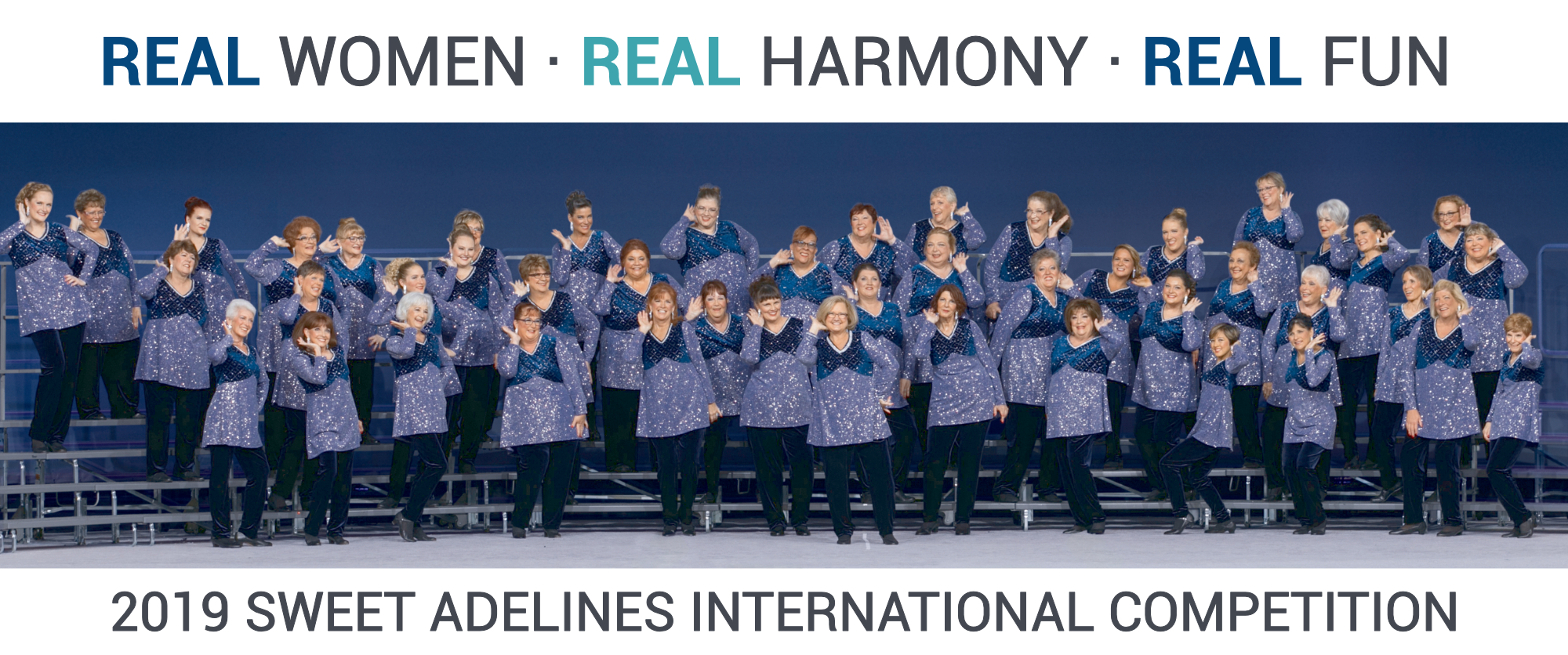 Real Women - Real Harmony - Real Fun; Shoreline Sound posing on stage at the 2019 Sweet Adelines International Competition in New Orleans, LA